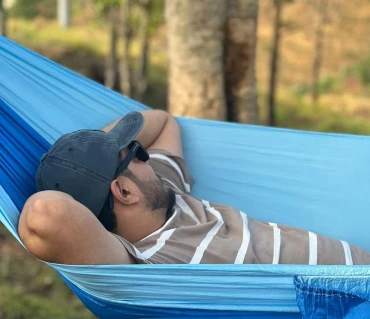 Niroj Shrestha enjoying Langtang Gear hammock adventure