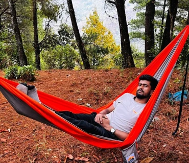 Nishwartha Dahal relaxing in Langtang Gear premium hammock